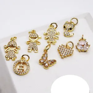 Detailed close-up of micro-pave cubic zirconia charms in gold-plated mixed designs