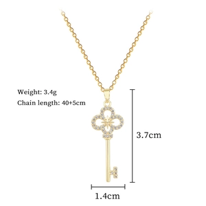 Detailed specs of the gold starburst cross pendant necklace with full zircon inlay