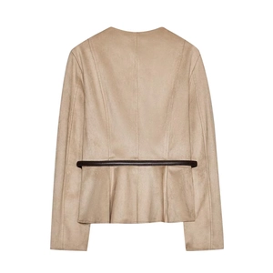 Detail of beige suede jacket back showing brown contrast waist trim and stitching