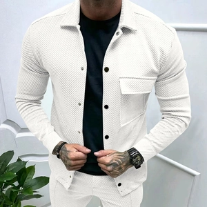Close-up of white ribbed twill fabric texture and black buttons on a men's slim jacket
