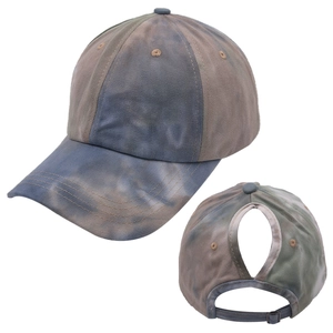 Detail view of tie-dye ponytail baseball cap featuring back opening and metal buckle