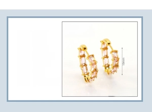 Detailed view of 18K gold plated earrings with pink zircon and 19mm diameter dimensions
