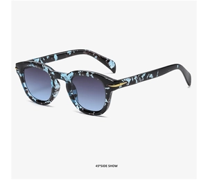 45-degree side view of trendy sunglasses with black blue marble frame and gradient lenses
