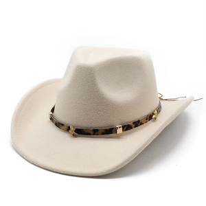 Detail of beige cowboy hat with leopard print band and gold star metal rivets
