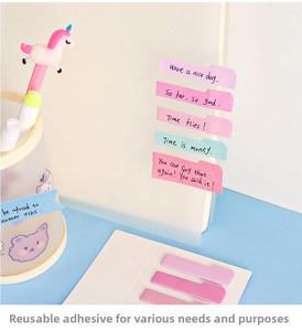 Macro view of gradient macaron sticky index tabs on notebook for office marking