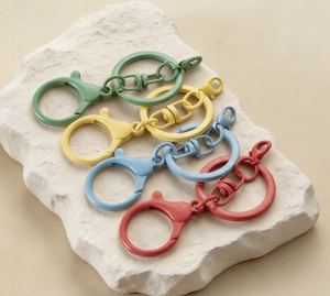 Detail of colorful matte lobster clasps with swivel rings for DIY jewelry accessories