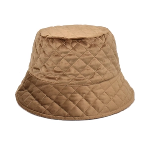 Quilted camel bucket hat with diamond lattice pattern and soft winter suede texture