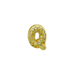 Macro detail of gold bubble letter Q pendant necklace with clear cubic zirconia stones