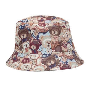 Retro style bucket hat featuring colorful cartoon bear jacquard patterns for sun protection