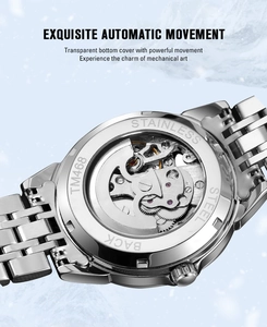 Detail view of the transparent case back showing the mechanical movement of the steel watch