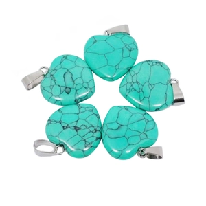 Five heart-shaped turquoise stone pendants with silver metal loops on white background