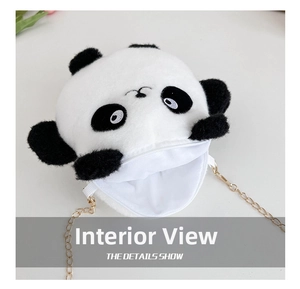 Detail view of the plush panda bag interior with zipper closure and gold chain strap