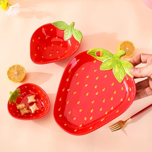 Cute strawberry shaped ceramic tableware set including red plates and dessert bowls