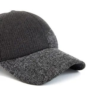 Men's winter baseball cap with ear flaps in grey textured tweed and curved brim