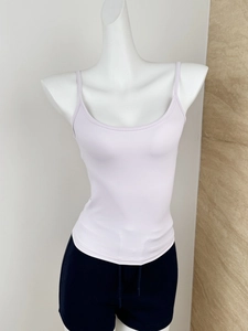 Detail of light purple slim fit tank top with thin straps on a mannequin display
