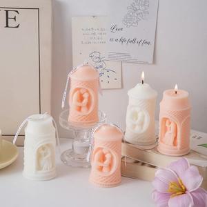 Pillar scented candles with romantic couple relief and silk ribbon for home decor