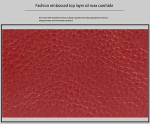 Macro shot of red embossed top layer oil wax cowhide showing premium leather texture
