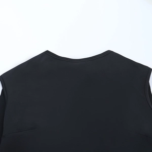 Close-up of the round neckline and seam stitching on a black sleeveless evening dress