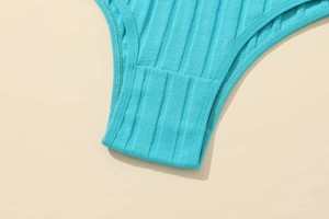 Detail of teal ribbed cotton underwear showing double-layer crotch and fine stitching