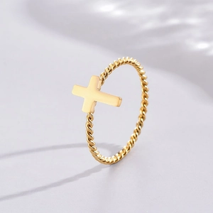 Minimalist twisted rope design stainless steel ring with central cross in gold finish