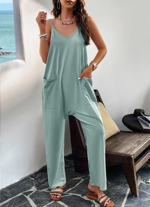 Combinaison turquoise sans manches avec col en V et poches, style estival en bord de mer