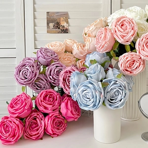 Artificial 7-head royal rose bouquet in various colors like pink and white in a vase