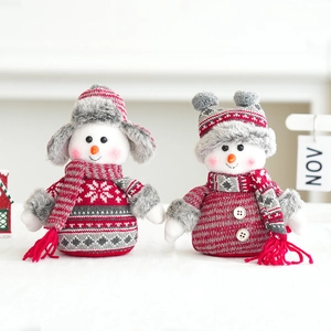 Pair of Christmas snowman plush dolls with red knit sweaters and carrot noses for decor