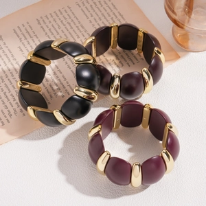 Retro geometric acrylic block bracelet in black, brown and red with gold metal links