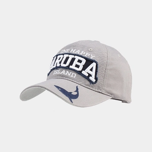 Close-up of One Happy Aruba Island 3D embroidery on a washed cotton baseball cap