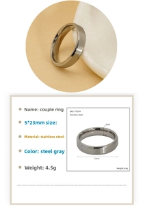 Close-up of stainless steel couple ring with brushed center and 5mm width details