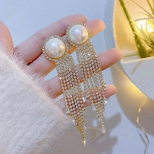 Elegant 925 silver needle gold-tone earrings with long crystal tassels and large white pearls