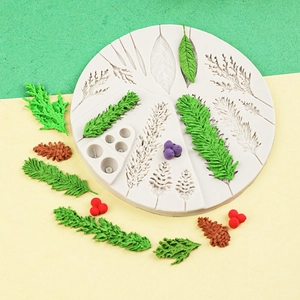 Macro detail of silicone mold with pine cone and leaf textures for Christmas fondant cake decor