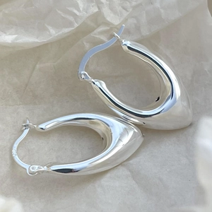 Polished S925 sterling silver U-shaped hoop earrings for women with minimalist design