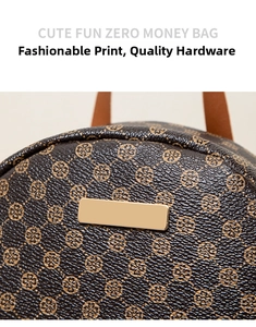 Close-up of brown floral patterned coin purse with premium lychee grain leather finish