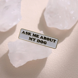 Minimalist white enamel dog lover brooch pin with Ask Me About My Dog lettering