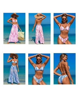 Three-piece bikini set with tie-dye print beach pants and halter top for beach vacations