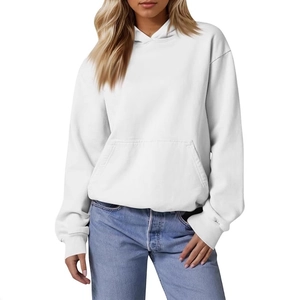 Women's oversized drop shoulder hoodie in white cotton paired with light blue denim jeans