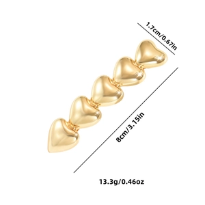 Gold metal heart hair clip with five linked hearts showing dimensions 8cm in length