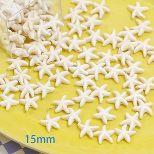Macro detail of 15mm white turquoise starfish beads for DIY jewelry making kits