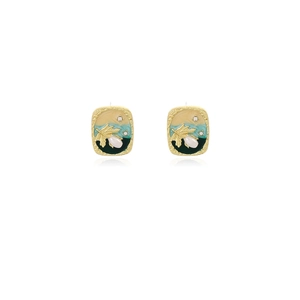 Detail of vintage enamel earrings with golden leaf and pearl on white background