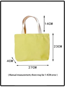 Solid bright yellow canvas tote bag with white handles and detailed size dimensions