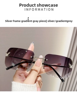 Detail of rimless rectangle sunglasses with gradient lenses and butterfly accents