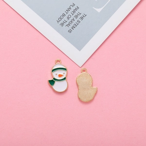 Detail of double-sided snowman alloy charms with colorful enamel finish for DIY jewelry