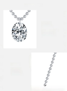 Macro shot of oval cut D-color moissanite pendant and S925 sterling silver ball chain