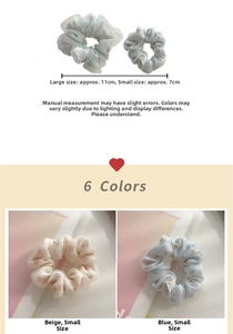 Detail of floral organza scrunchies in blue and beige with two size specifications