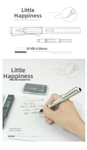 Detailed structure of light blue ergonomic fountain pen and hand writing on grid paper