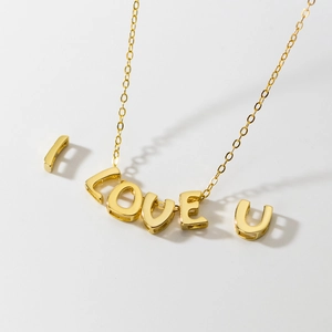 Elegant s925 silver necklace with golden I LOVE U letter pendants on white background