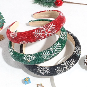 Set of three rhinestone snowflake padded headbands in red, green, and black holiday colors