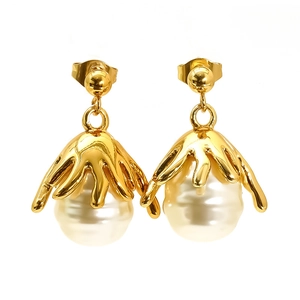 2025 Vintage flower shaped golden earrings with white pearls in a modern artistic design