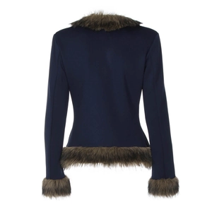 Detail view of the back of a navy blue slim jacket with brown faux fur trim accents